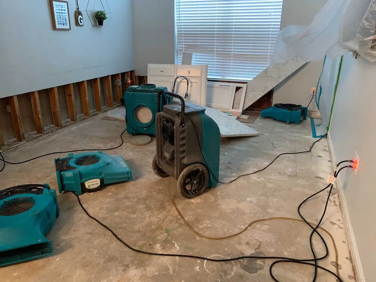 Dehumidifier in flood-cut room for Water Damage Restoration in Longwood